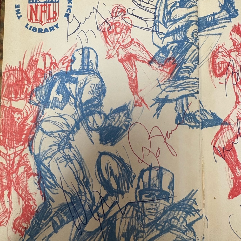 Vintage NFL Illustrated book autographed by 1973 Philadelphia Eagles team member